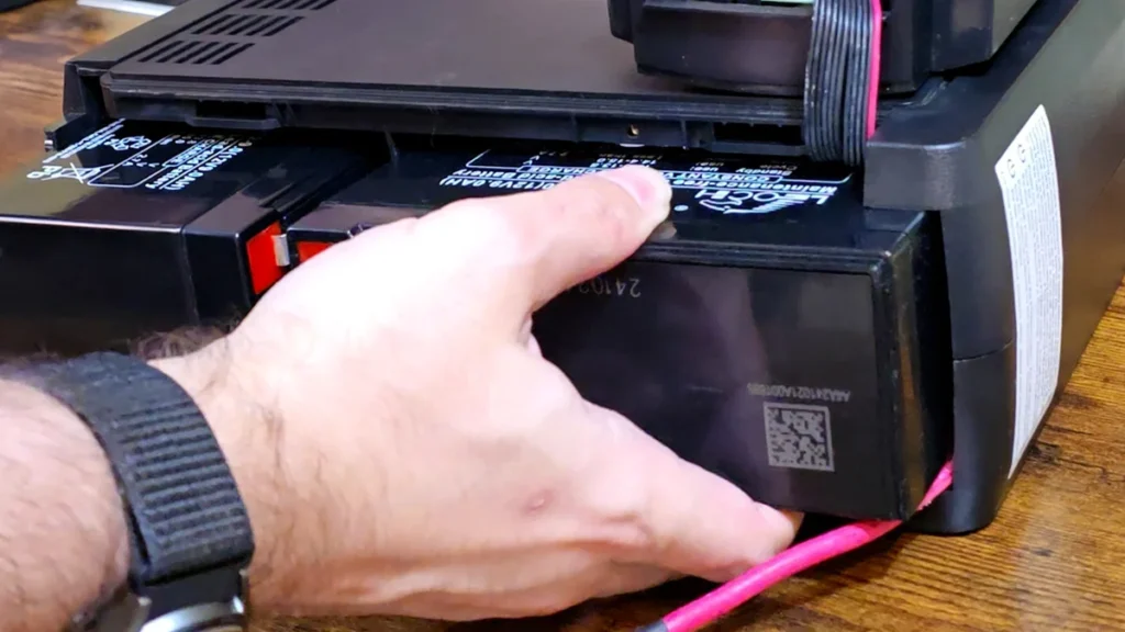 slide batteries back into compartment