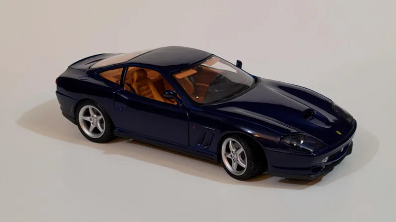 The same model car under flat even lighting with a dead background