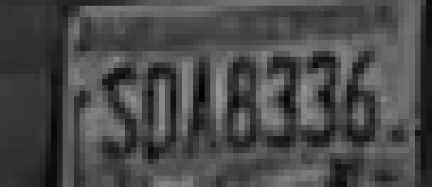 Licence plate filling 76 pixels of the A229 Plus frame, mostly legible with one ambiguous character